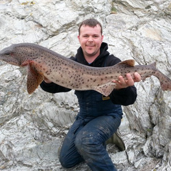 Gary Mitchell with a shore caught Bull Buss - 14lb 5oz (2nd May 2014)