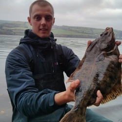 Carl McCormack with a shore caught Flounder - 2lb 11oz 4dr (29th November 2014)