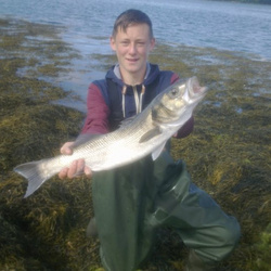 Charlie Gray with a shore caught Bass - 6lb 2oz (8th July 2014)