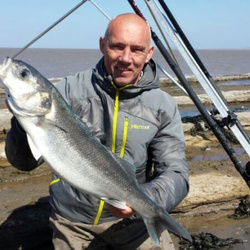 Rob Yorke with a shore caught Bass - 7lb 5oz (13th April 2014)