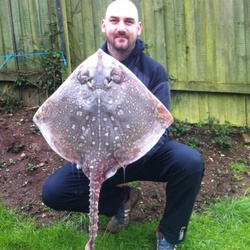 Lee Vosper with a shore caught Thornback Ray - 13lb 13oz (2nd February 2013)