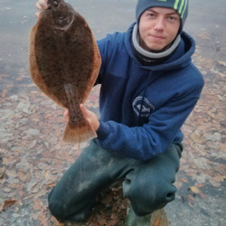 Steve King with a shore caught Flounder - 3lb 9oz (1st December 2013)