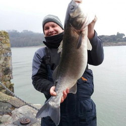 Mark Bryce with a shore caught Bass - 13lb 10oz (18th January 2013)