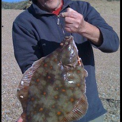 Mike Hodge with a shore caught Plaice - 4b 13oz (October 2010)