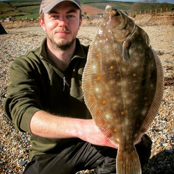 Steve King with a shore caught Plaice - 2lb 9oz 8dr (17th April 2016)