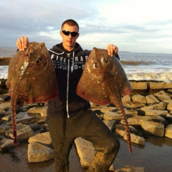 Carl Mccormack with a shore caught Thornback Ray - biggest 10lb 11oz (26th January 2013)