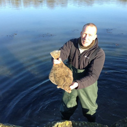 Rob Wheaton with a shore caught Flounder - 2lb.15oz (30/12/2014)