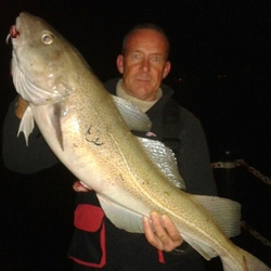 Rob Wheaton with a shore caught Cod - 14lb 11 (28/11/13)